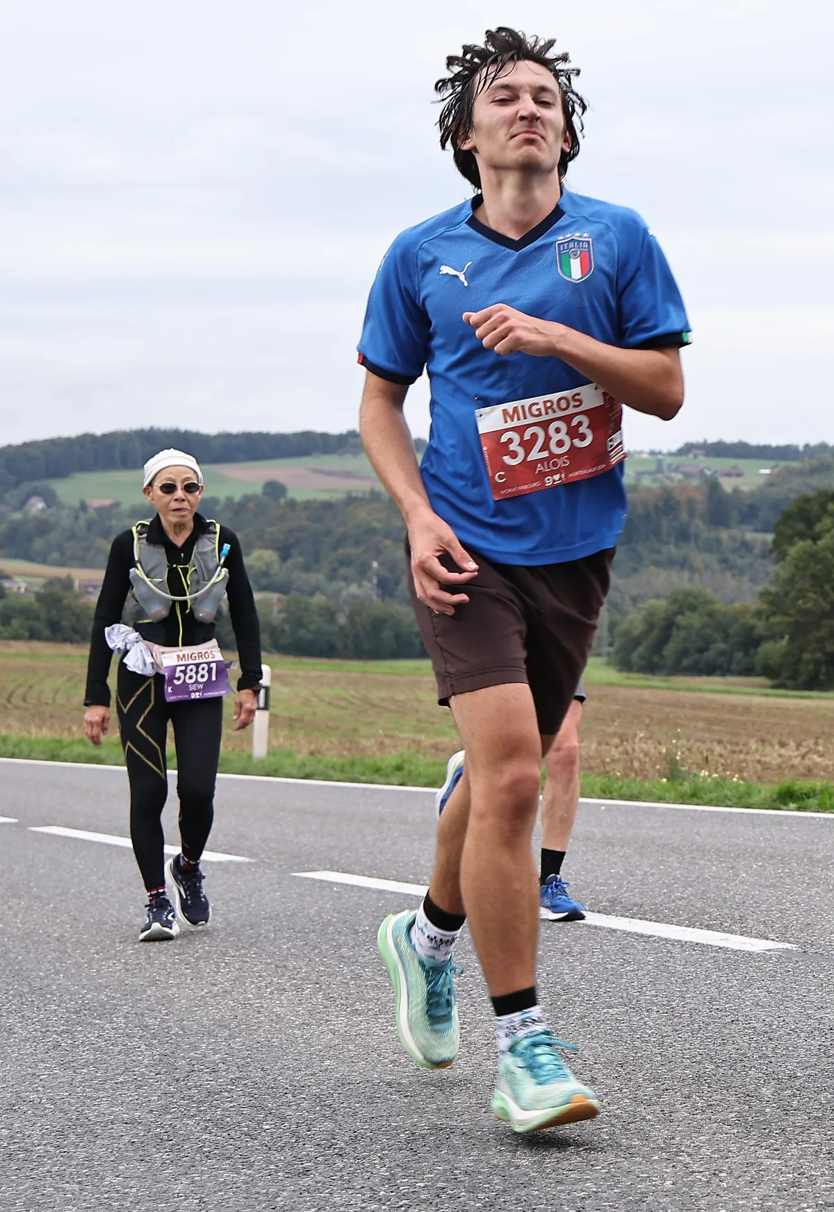 me running with my italian t-shirt and taking a big breath in through my nose. An asian old lady walking behind me, looking like a badass.